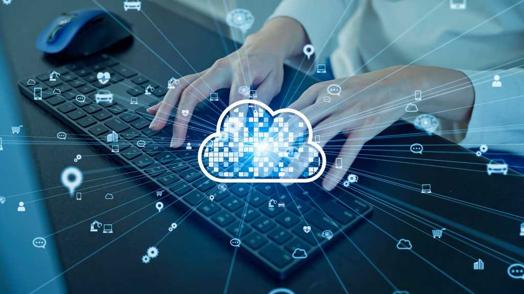 Cloud computing concept with engineer using computer in office.